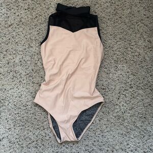 Five Dancewear tan leotard with black trim.  Gorgeous back detail!